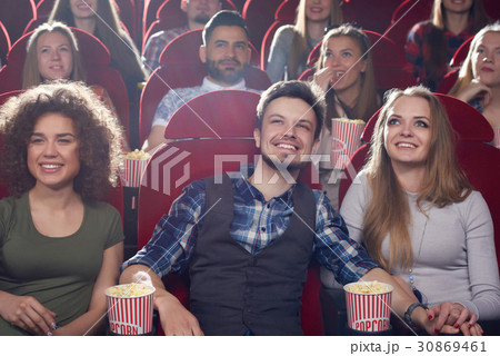 Three smiling best friends spending free time at 30869461