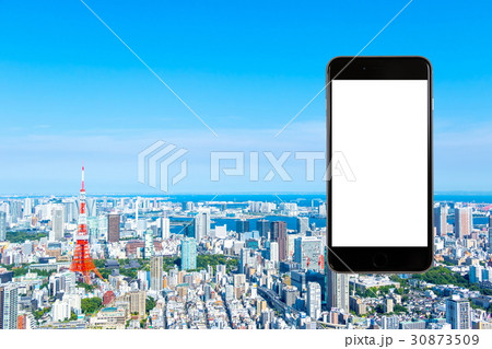 スマホ 携帯電話 スマートフォン 都市風景 東京 不動産イメージ スマホ 携帯電話 スマートフォン 都市風景 東京 不動産イメージ 30873509