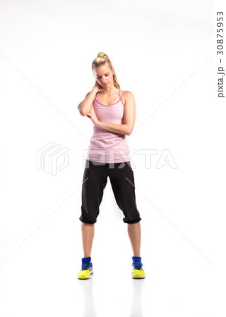 Attractive young fitness woman in sports clothes Attractive young fitness woman in sports clothes 30875953