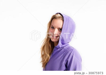 Young fitness woman in purple sweatshirt. Studio 30875973