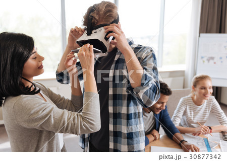 Nice handsome man wearing a virtual reality Nice handsome man wearing a virtual reality 30877342