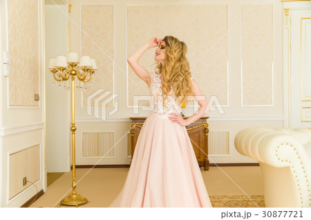 Portrait of beautiful young bride. A girl is Portrait of beautiful young bride. A girl is 30877721