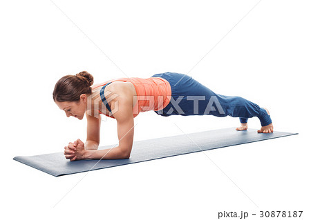 Woman doing Yoga asana Chaturanga dandasana  plan 30878187