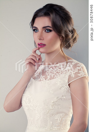 Cute Bride with Beautiful Hairstyle and Makeup Cute Bride with Beautiful Hairstyle and Makeup 30878446