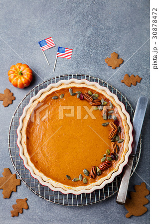 Pumpkin pie, tart with American flag. Top view. 30878472