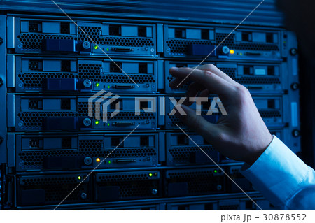 Close up of a hand pressing the button 30878552