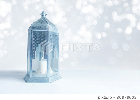Ornamental silver and blue Arabic lantern on the Ornamental silver and blue Arabic lantern on the 30878605