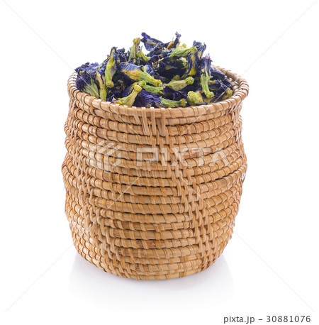 Dried pea flower in basket on white background Dried pea flower in basket on white background 30881076
