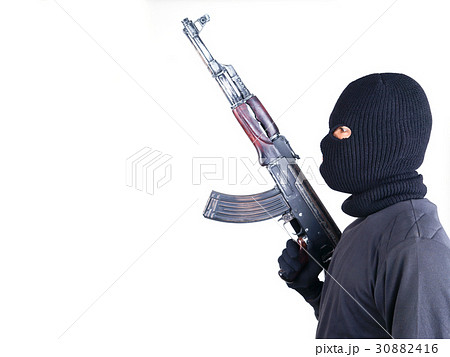 terrorist with ak47 machine gun 30882416
