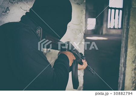 terrorist in black uniform terrorist in black uniform 30882794