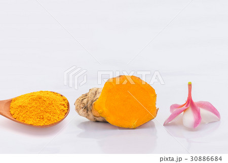 Soft focus of Turmeric powder on the wooden spoon, 30886684