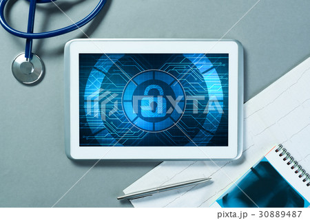 Web security and technology concept with tablet pc on table 30889487