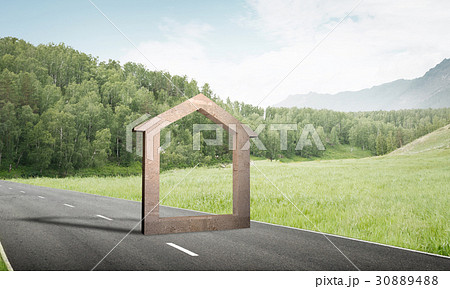 Conceptual background image of concrete home sign on asphalt road 30889488