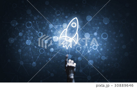 Technology idea concept with glowing rocket icon and touching it finger 30889646