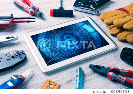 Web security and technology concept with tablet pc on wooden table Web security and technology concept with tablet pc on wooden table 30890353