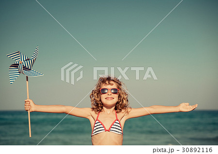 Happy child on summer vacation Happy child on summer vacation 30892116