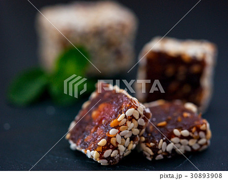 Turkish delight on black rustic background Turkish delight on black rustic background 30893908