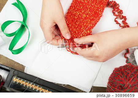 child girl knit, hand closeup, handmade concept child girl knit, hand closeup, handmade concept 30896659