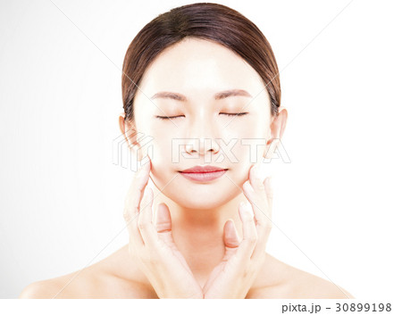 closeup young woman face isolated on white closeup young woman face isolated on white 30899198