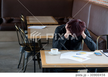 business man sitting in depression 30900456