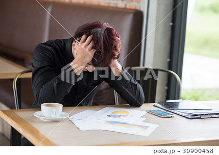 business man sitting in depression  30900458