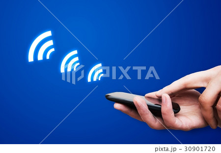 Hand holding smartphone with NFC technology Hand holding smartphone with NFC technology 30901720