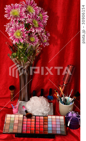 Cosmetics and flowers 30906154