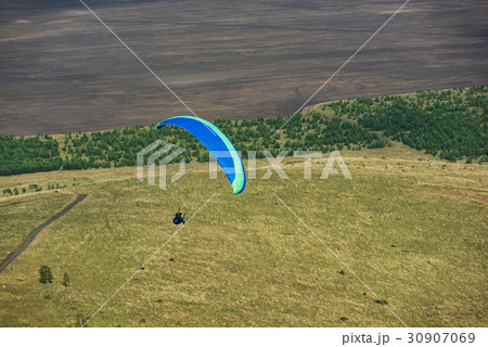 Paragliding in mountains Paragliding in mountains 30907069