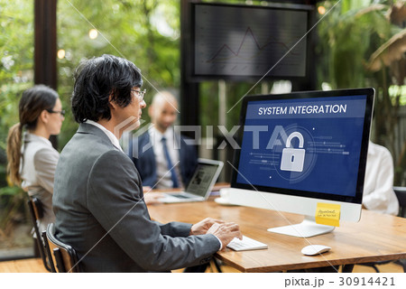 Man working on computer network graphic overlay 30914421