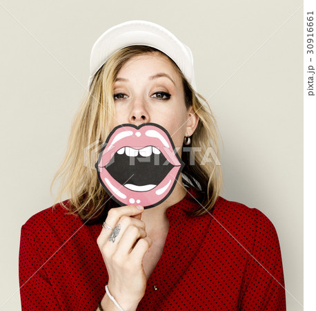 Caucasian Woman with White Holding Paper Lips Caucasian Woman with White Holding Paper Lips 30916661