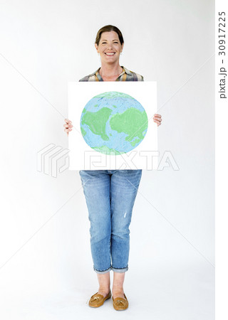 Woman standing and holding banner Woman standing and holding banner 30917225