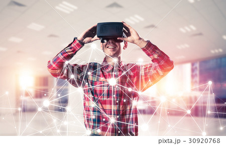 Guy wearing checked shirt and virtual mask demonstrating some emotions 30920768
