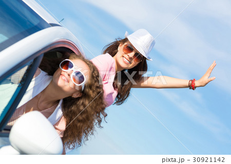 Young woman got out of car window Young woman got out of car window 30921142