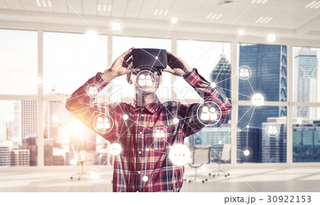 Guy wearing checked shirt and virtual mask demonstrating some em Guy wearing checked shirt and virtual mask demonstrating some em 30922153