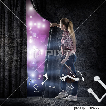 young woman pushes the curtain young woman pushes the curtain 30922706