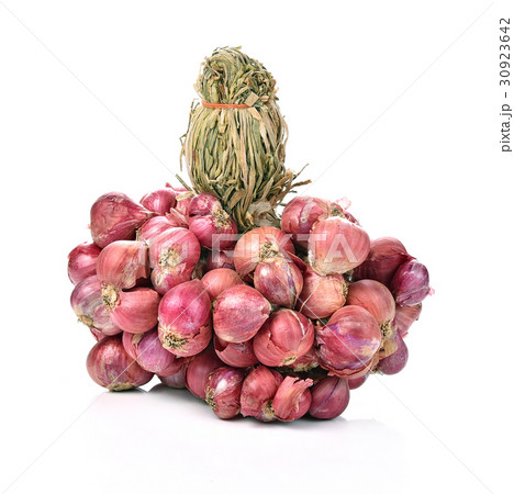 bunch of small thai red onions on white background 30923642