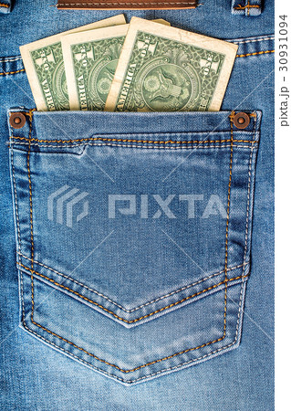 Dollar banknotes in jeans pocket closeup. 30931094