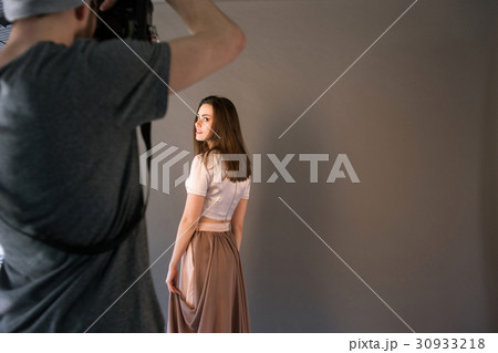 Professional shooting in prom dress. 30933218