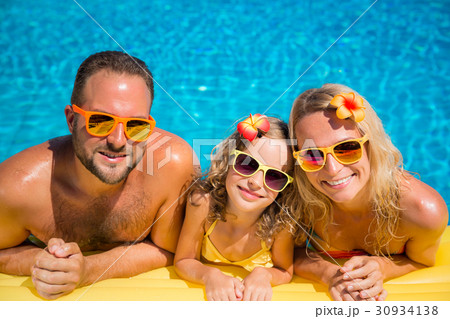 Happy family having fun on summer vacation Happy family having fun on summer vacation 30934138