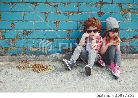photo of two cute hipsters photo of two cute hipsters 30937355