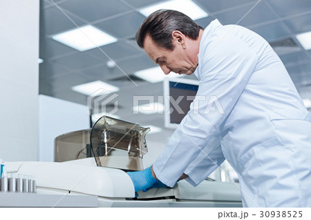 Exhausted gray-haired man bowing his head Exhausted gray-haired man bowing his head 30938525