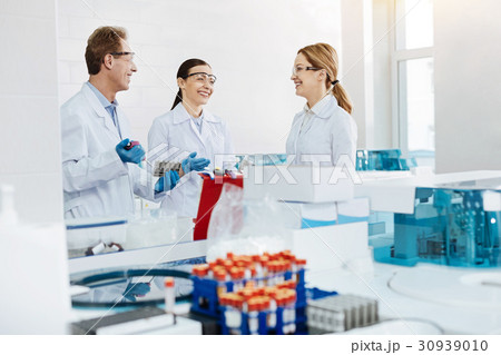 Three young practitioners having conversation 30939010