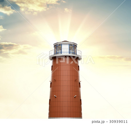 A lighthouse against a background of sunrise A lighthouse against a background of sunrise 30939011
