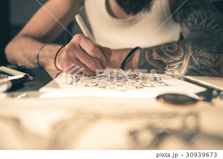 Male creating image by pencil Male creating image by pencil 30939673