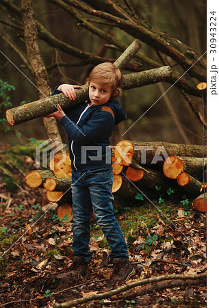 little sweet lumberjack in autumn forest 30943224