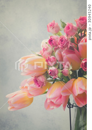 Pink and yellow tulips and roses Pink and yellow tulips and roses 30945240