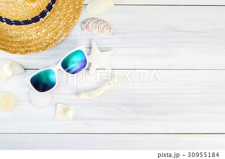 Summer Beach accessories on wood table Summer Beach accessories on wood table 30955184