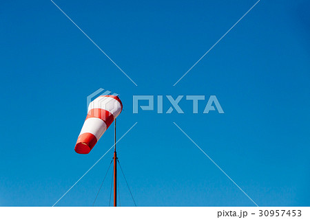 Airport windsock on clear blue sky background 30957453