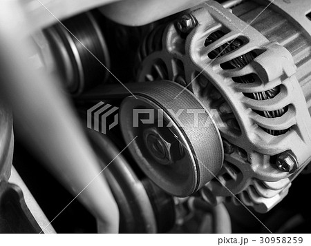 Close up of Car Alternator and Timimg belt Close up of Car Alternator and Timimg belt 30958259