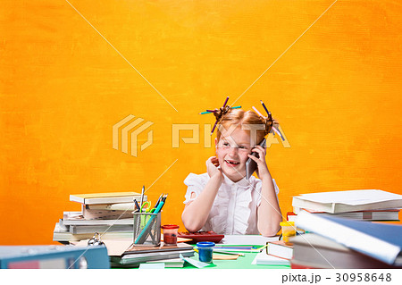 The Redhead teen girl with lot of books at home 30958648